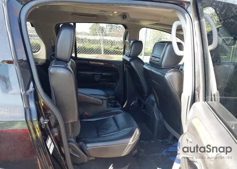 2014 Nissan Armada Platinum z USA, uszkodzony, nr VIN 5N1BA0NE2EN609087